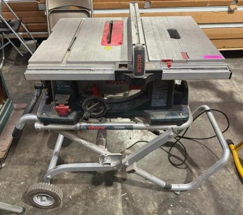 DESCRIPTION: 10" CORDED JOBSITE TABLE SAW ON GRAVITY RISE STAND BRAND/MODEL: BOSCH 4100 LOCATION: WAREHOUSE QTY: 1