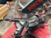 DESCRIPTION: 12" SLIDING COMPOUND MITER SAW BRAND/MODEL: BOSCH 5412L LOCATION: WAREHOUSE QTY: 1 - 2