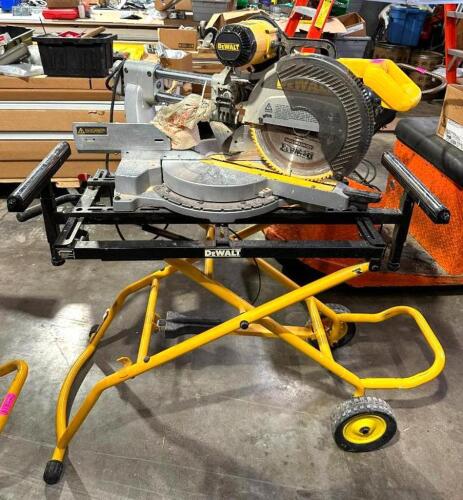 DESCRIPTION: 12" SLIDING COMPOUND MITER SAW ON STAND BRAND/MODEL: DEWALT DW708 LOCATION: WAREHOUSE QTY: 1