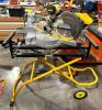 DESCRIPTION: 12" SLIDING COMPOUND MITER SAW ON STAND BRAND/MODEL: DEWALT DW708 LOCATION: WAREHOUSE QTY: 1