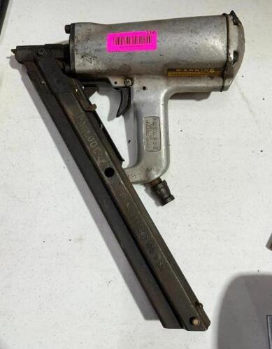 DESCRIPTION: PNEUMATIC NAIL GUN BRAND/MODEL: PASLODE LOCATION: WAREHOUSE QTY: 1