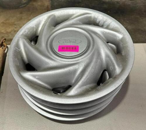 DESCRIPTION: (4) 16" FORD HUB CAPS LOCATION: WAREHOUSE QTY: 1