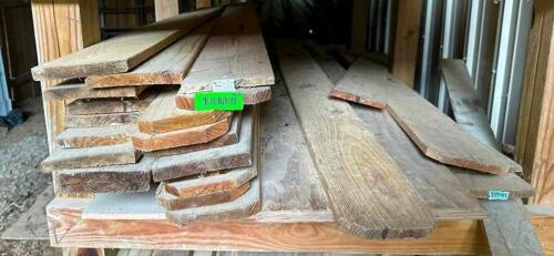 DESCRIPTION: CONTENTS OF FRONT SHELF INFORMATION: ASSORTED FENCING PLANKS LOCATION: BACK SHED QTY: 1