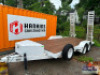 16' TANDEM AXLE FLAT BED TRAILER W/ HEAVY DUTY RAMPS.