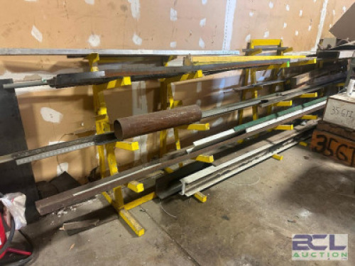 METAL TREE RACK AND CONTENTS - ASSORTED METAL, ANGLE IRON, AND MISC SCRAP METAL.