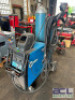 MILLERMATIC 252 MIG WELDER W/ (2) CYLINDER TANKS, SPOOL GUN, AND HOOD.