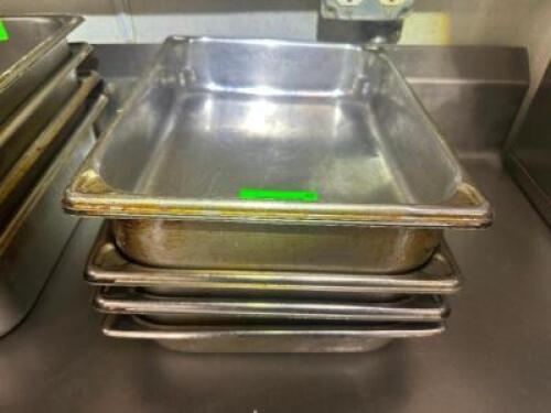 (4) HALF SIZE STAINLESS INSERTS.
