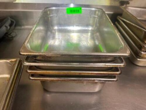 (4) HALF SIZE STAINLESS INSERTS.