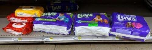 (4) PACKS OF DIAPERS AND (4) PACKS OF BABY WIPES