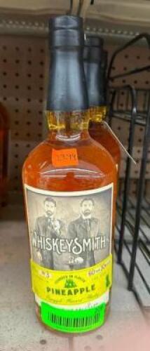 (4) BOTTLES OF PINEAPPLE FLAVORED WHISKY