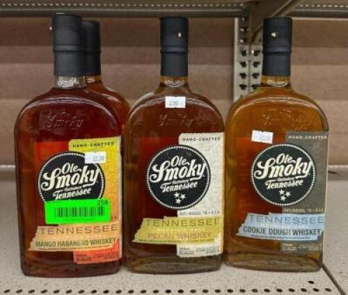 (2) BOTTLES OF MANGO HABANERO (1) PECAN AND (1) COOKIE DOUGH WHISKEY