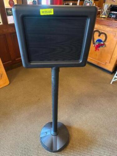 BLACK PLASTIC SIGN W/ STAND.
