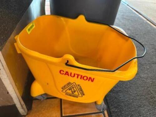 YELLOW MOP BUCKET.