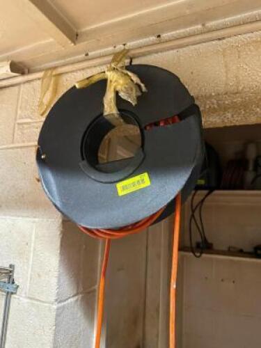 EXTENSION CORD AND PLASTIC REEL.