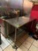 50" STAINLESS TABLE WITH WIRE UNDERSHELF ON CASTERS - 2