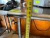 48" STAINLESS TABLE WITH WIRE UNDERSHELF ON CASTERS - 4