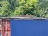 SCAFOLDING CONTENTS ON TOP OF CONTAINER - 3