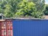 SCAFOLDING CONTENTS ON TOP OF CONTAINER - 4