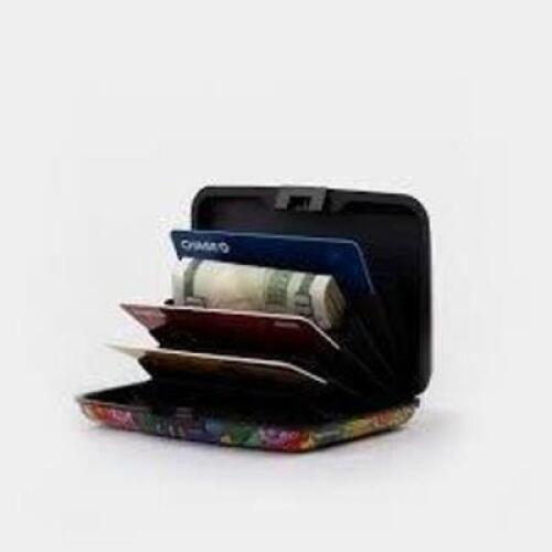 DESCRIPTION: (1) CASE OF APPROX (50) METAL WALLETS BRAND/MODEL: ARMORED WALLET INFORMATION: MANY DESIGNS QTY: 1