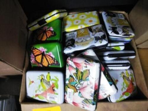 DESCRIPTION: (1) CASE OF APPROX (50) METAL WALLETS BRAND/MODEL: ARMORED WALLET INFORMATION: MANY DESIGNS QTY: 1