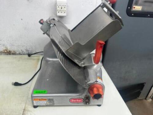 DESCRIPTION BERKEL 909E DELI SLICER BRAND / MODEL: BERKEL 909E ADDITIONAL INFORMATION SN# 9610111111454, 115 VOLT, 1 PHASE LOCATION MEAT ROOM QTY 1