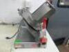 DESCRIPTION BERKEL 909E DELI SLICER BRAND / MODEL: BERKEL 909E ADDITIONAL INFORMATION SN# 9610111111454, 115 VOLT, 1 PHASE LOCATION MEAT ROOM QTY 1