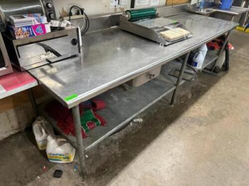 DESCRIPTION 10' X 36" STAINLESS TABLE W/ 4" BACK SPLASH ADDITIONAL INFORMATION CONTENTS ARE NOT INCLUDED SIZE 10' X 36" LOCATION BACK ROOM QTY 1