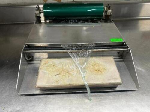 DESCRIPTION HEAT N SEAL WRAPPING STATION BRAND / MODEL: HEAT N SEAL LOCATION BACK ROOM QTY 1
