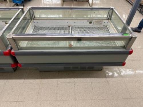 DESCRIPTION HUSSMAN 64" COFFIN FREEZER. BRAND / MODEL: HUSSMAN ISFGG-5B ADDITIONAL INFORMATION PROFESSIONAL PUMP DOWN REQUIRED. COMPRESSOR ON ROOF. SI