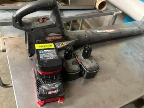 DESCRIPTION CORDLESS LEAF BLOWER W/ CHARGER AND (2) BATTERIES. LOCATION BACK ROOM QTY 1