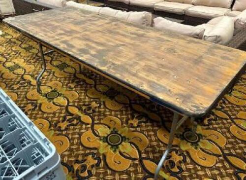 DESCRIPTION (2) 6' WOODEN FOLDING BANQUET TABLE. ADDITIONAL INFORMATION SECOND DAY PICK UP ONLY. CONTENTS ARE NOT INCLUDED. ALL FOLDING TABLES ARE DIF