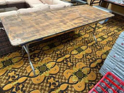 DESCRIPTION (2) 6' WOODEN FOLDING BANQUET TABLE. ADDITIONAL INFORMATION SECOND DAY PICK UP ONLY. CONTENTS ARE NOT INCLUDED. ALL FOLDING TABLES ARE DIF