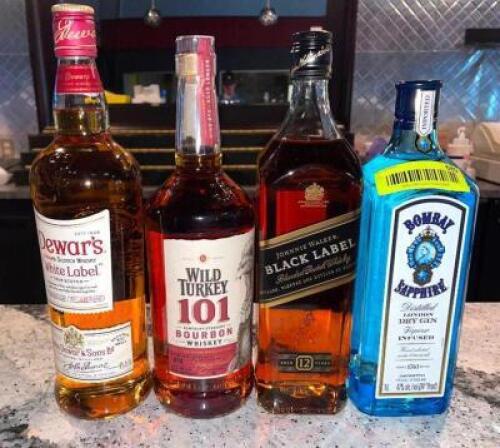 DESCRIPTION: (4) ASSORTED BOTTLES OF LIQUOR LOCATION: MAIN BAR QTY: 4