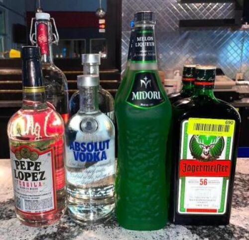 DESCRIPTION: ASSORTED BOTTLES OF LIQUOR AS SHOWN LOCATION: MAIN BAR QTY: 1