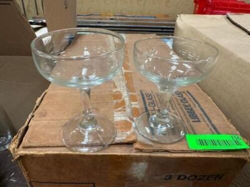DESCRIPTION (12) 8 OZ CHAMPAGNE GLASSES THIS LOT IS: SOLD BY THE PIECE LOCATION BANQUET ROOM TABLE 1 QTY 12