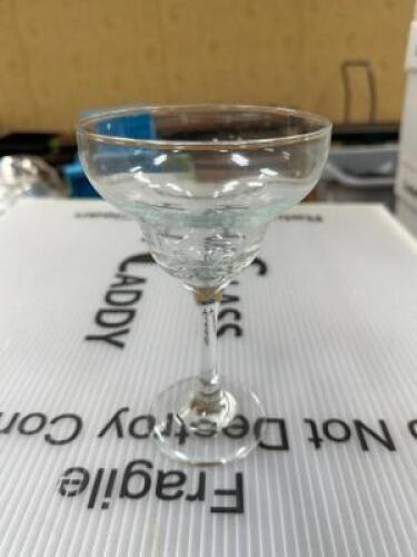DESCRIPTION (16)CHAMPAGNE GLASSES ADDITIONAL INFORMATION W/ RACK THIS LOT IS: SOLD BY THE PIECE LOCATION BANQUET ROOM TABLE 1 QTY 16