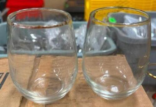 DESCRIPTION (50) SMALL STEMLESS WINE GLASSES ADDITIONAL INFORMATION W/ RACK THIS LOT IS: SOLD BY THE PIECE LOCATION BANQUET ROOM TABLE 1 QTY 50