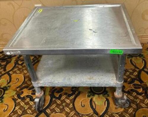DESCRIPTION: 30" EQUIPMENT STAND ON CASTERS SIZE: 30"X24" LOCATION: BANQUET HALL QTY: 1