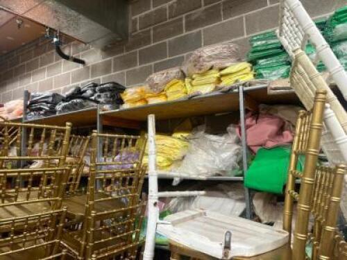 DESCRIPTION CONTENTS OF SHELF - LARGE LOT OF ASSORTED LINENS, CHAIR COVERS, AND TABLE SKIRTS ADDITIONAL INFORMATION ASSORTED COLORS AND SIZES THIS LOT