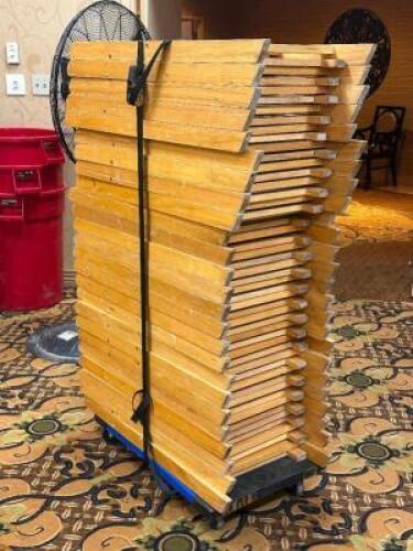 DESCRIPTION: (25) - WOOD PADDED FOLDING CHAIRS ADDITIONAL INFORMATION: ASSORTED CONDITIONS. DOLLY NOT INCLUDED. THIS LOT IS: SOLD BY THE PIECE QTY: 25