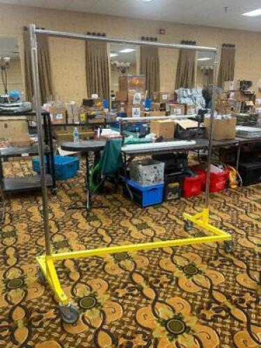 DESCRIPTION: 6 FT. HEAVY DUTY ROLLING GARMENT RACK ADDITIONAL INFORMATION: SINGLE RACK ONLY. ASSORTED CONDITIONS. THIS LOT IS: ONE MONEY QTY: 1