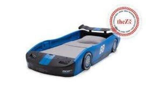 DESCRIPTION: (1) TURBO RACE CAR BED BRAND/MODEL: DELTA CHILDREN #BB87005GN INFORMATION: BLUE SIZE: TWIN SIZE RETAIL$: $189.00 EA QTY: 1