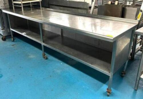DESCRIPTION: 10' STAINLESS STEEL TABLE WITH ENCLOSED WELDED UNDERSHELF ON CASTERS SIZE: 120"X30"X36" LOCATION: KITCHEN QTY: 1