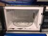 DESCRIPTION: COUNTERTOP RESIDENTIAL MICROWAVE BRAND/MODEL: MAGIC CHEF LOCATION: KITCHEN QTY: 1 - 4