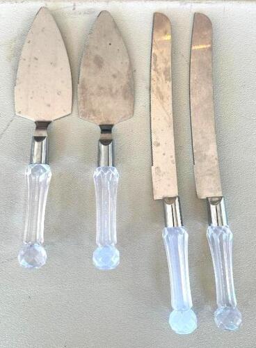 DESCRIPTION: (2) CAKE SERVERS AND KNIFE SETS LOCATION: 6TH FLOOR QTY: 2