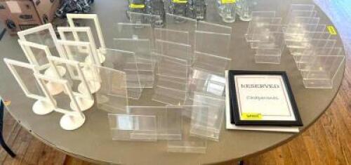 DESCRIPTION: ASSORTED TABLE SIGN STANDS AS SHOWN LOCATION: 7TH FLOOR QTY: 1