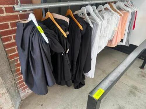 DESCRIPTION CONTENTS OF RACK (12) ASSORTED TABLE CLOTHES AND SKIRTS. THIS LOT IS: ONE MONEY LOCATION FLOOR 8 QTY 1