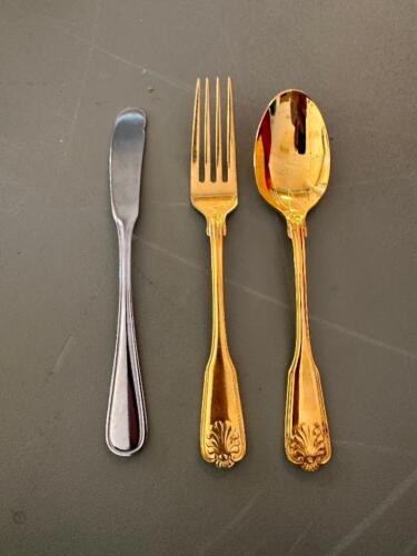 DESCRIPTION SILVER WARE RACK W/ ASSORTED GOLD COLOR SILVERWARE. THIS LOT IS: ONE MONEY LOCATION FLOOR 7 QTY 1