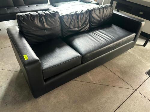 DESCRIPTION THREE CUSHION BLACK PLEATHER SOFA LOCATION FIRST FLOOR QTY 1
