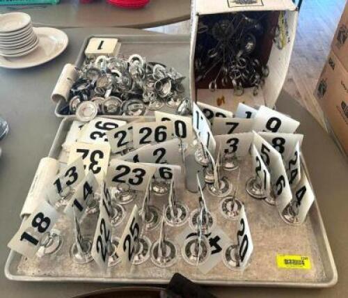 DESCRIPTION: ASSORTED TABLE NUMBER SIGNS AS SHOWN LOCATION: 7TH FLOOR QTY: 1